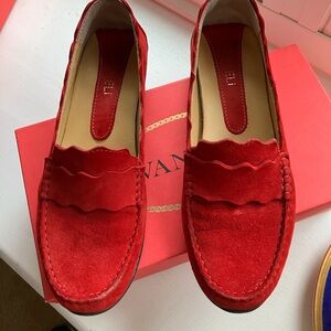 Red driving loafers.